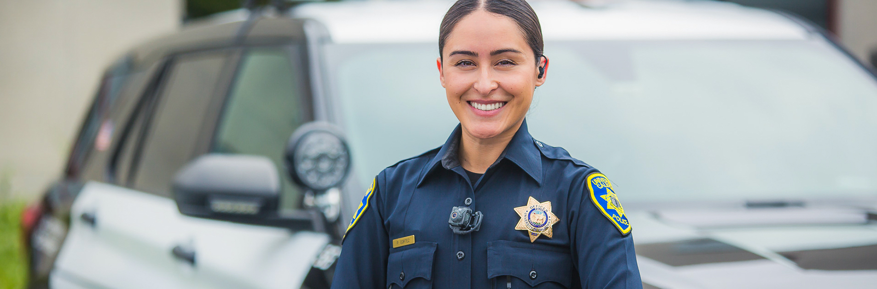 Officer Cortez smiling at camera