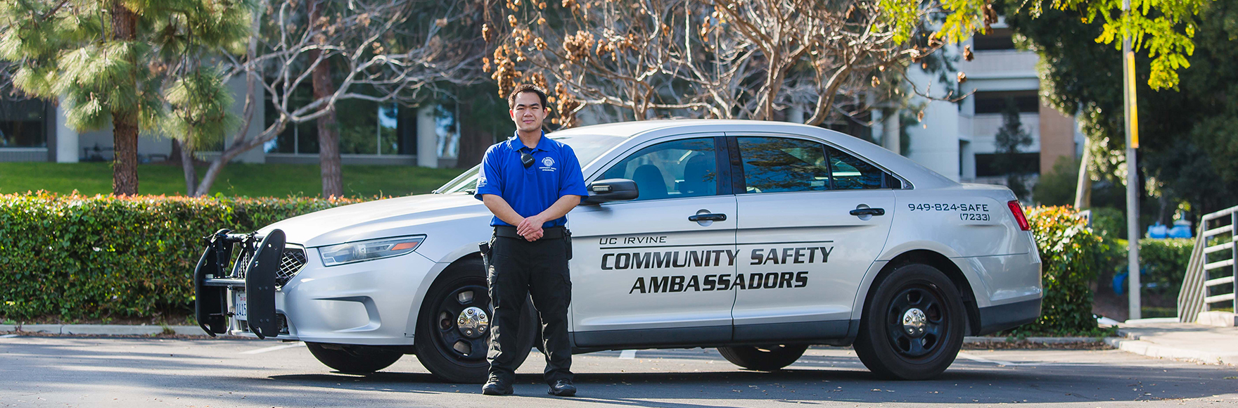 Two Community Safety Ambassadors smile for the camera