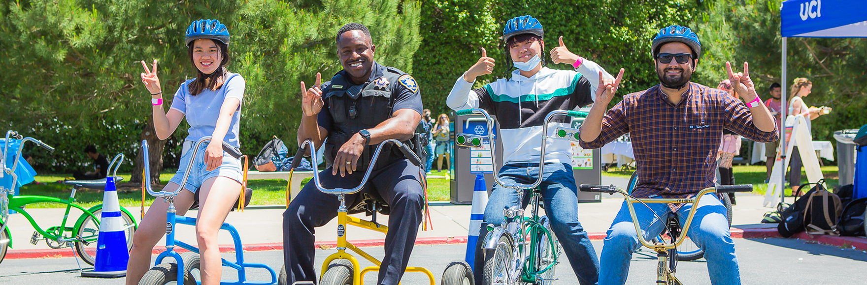 Officer Akingbemi posing with students