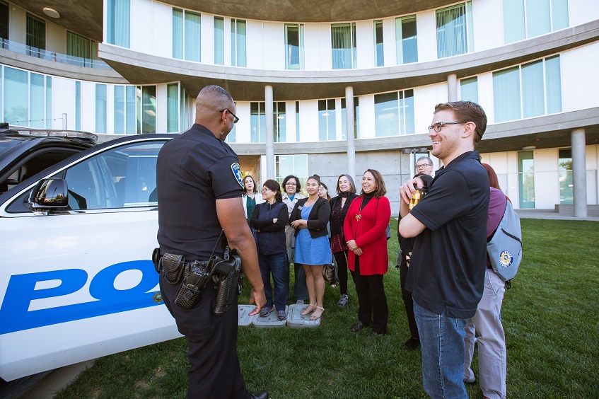 Officer Green presenting to faculty and staff during our Behind the Badge event.